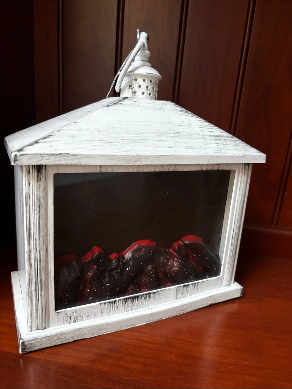 A Cheerful Giver Flameless White Fireplace Lantern distressed white finish .